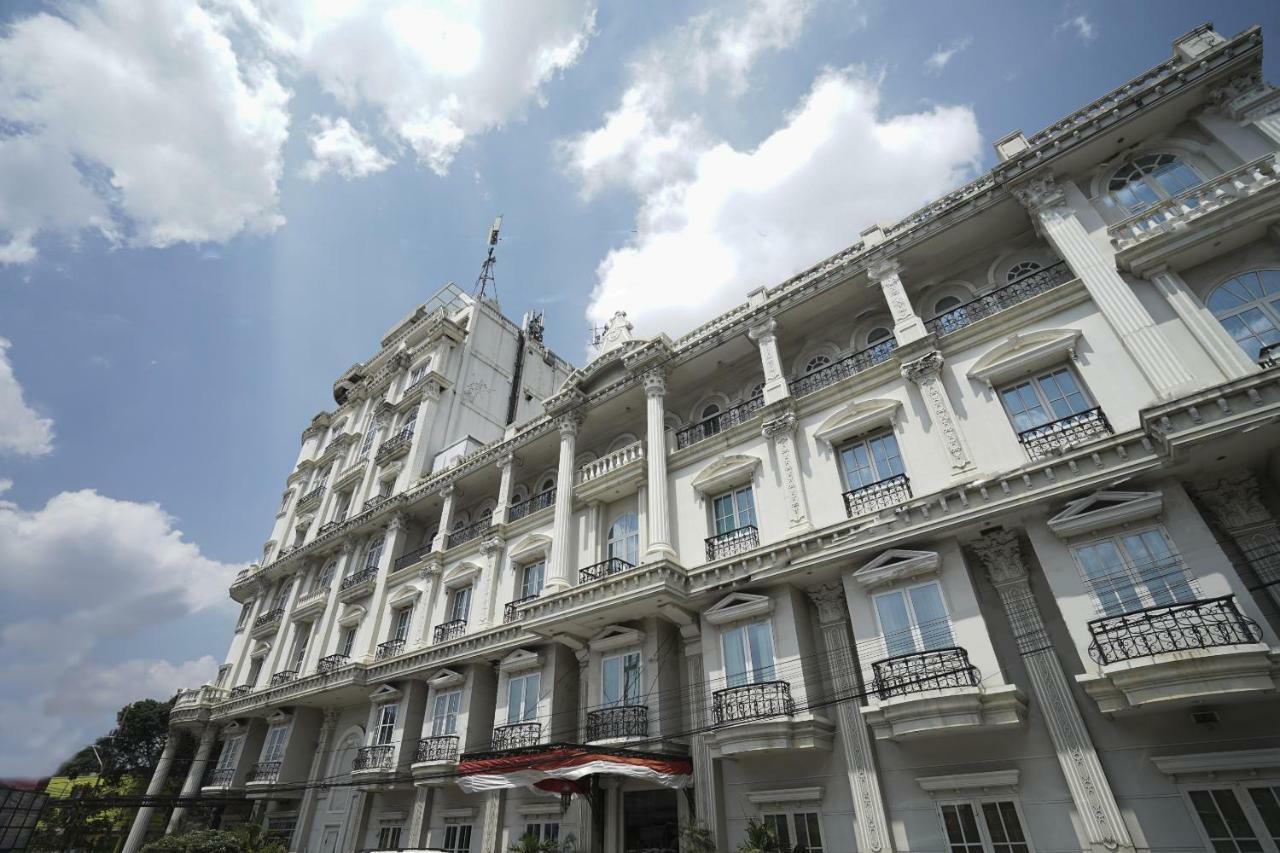 Capital O 1128 Hotel Imara Palembang Exterior foto