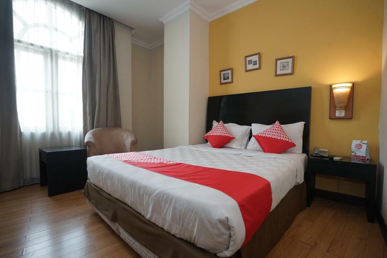 Capital O 1128 Hotel Imara Palembang Exterior foto