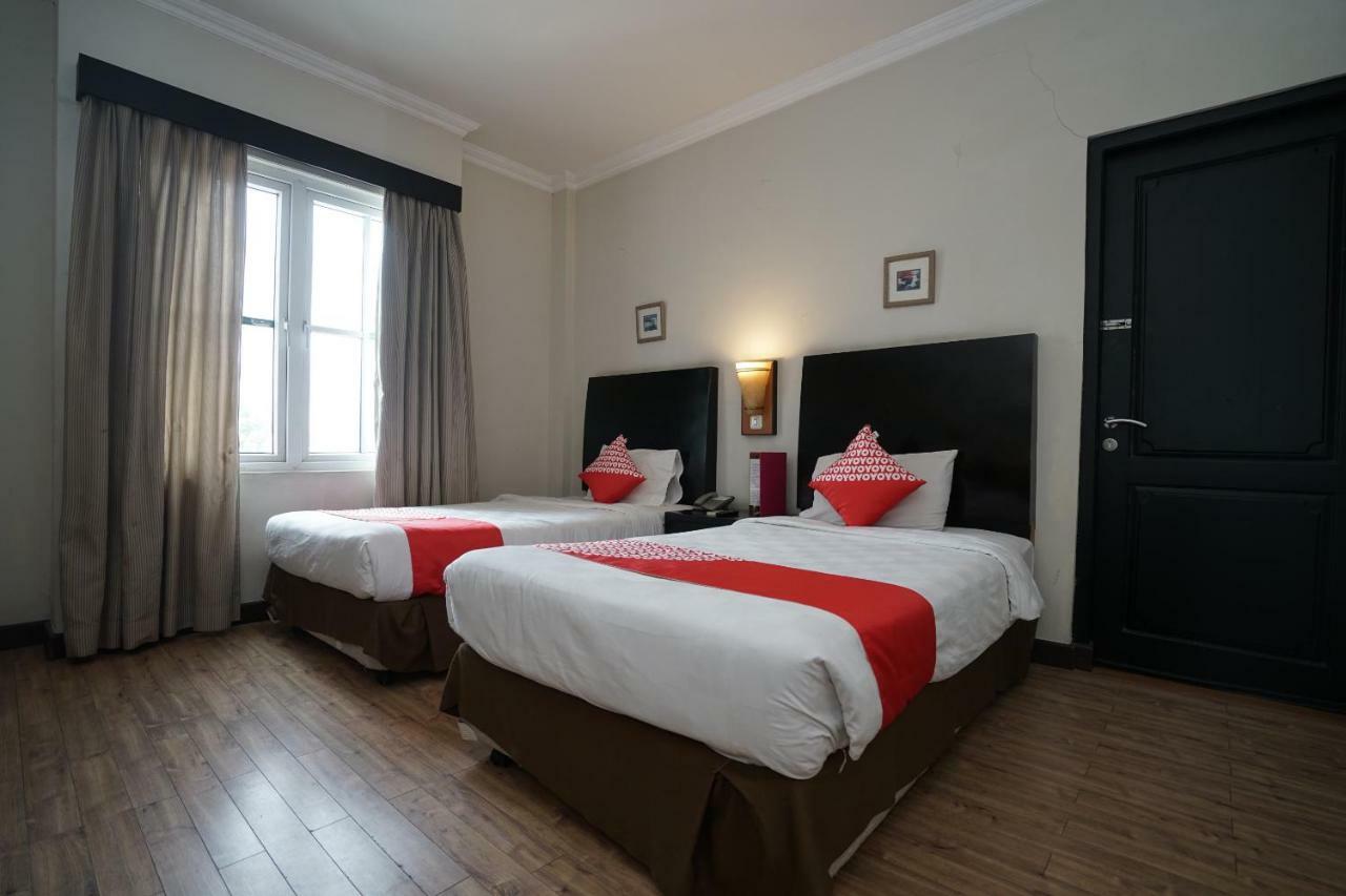 Capital O 1128 Hotel Imara Palembang Exterior foto