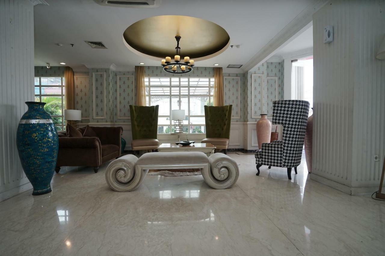 Capital O 1128 Hotel Imara Palembang Exterior foto