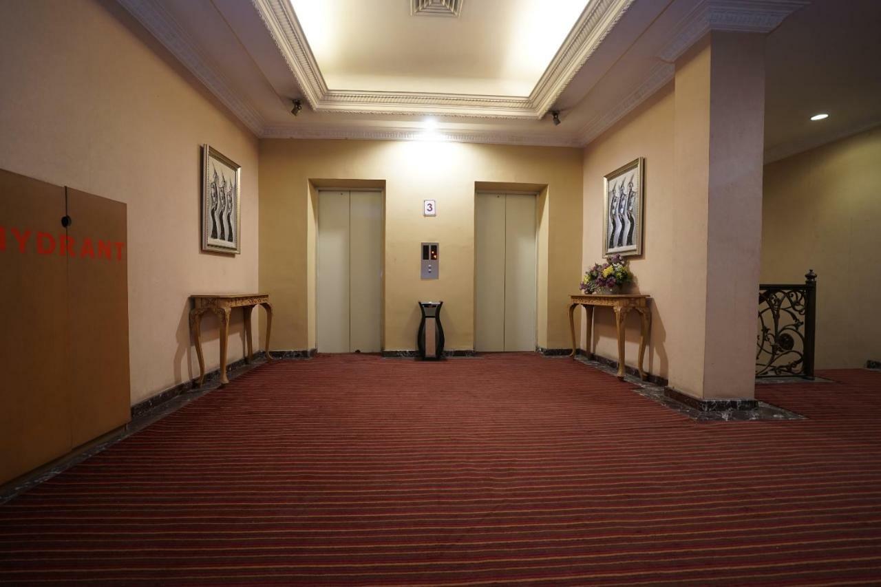 Capital O 1128 Hotel Imara Palembang Exterior foto