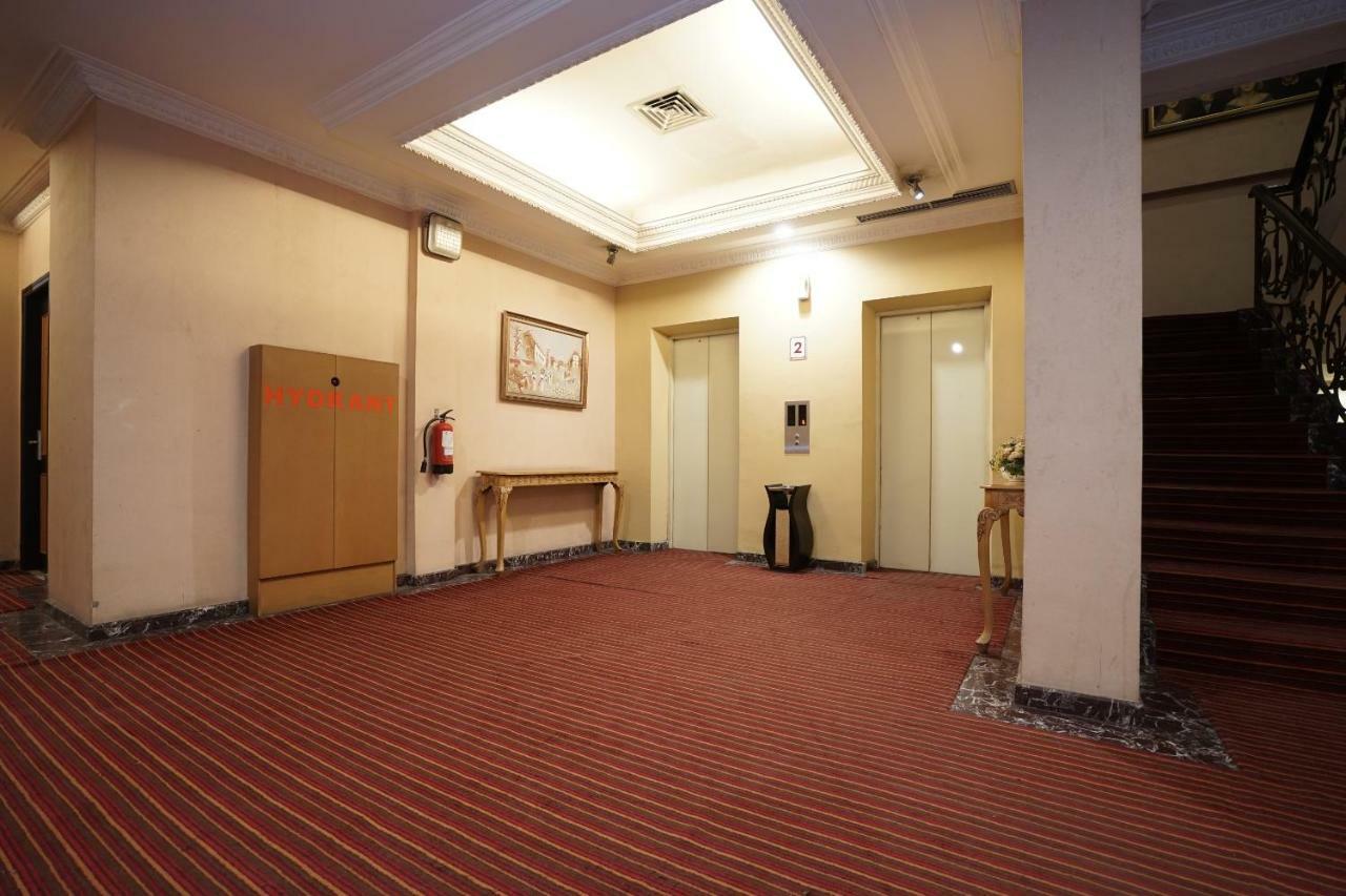 Capital O 1128 Hotel Imara Palembang Exterior foto