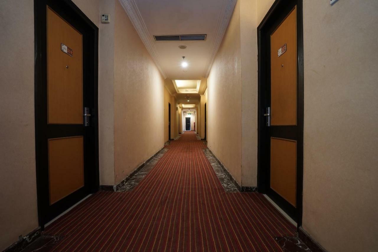Capital O 1128 Hotel Imara Palembang Exterior foto